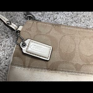Coach small wristlet-cream color
